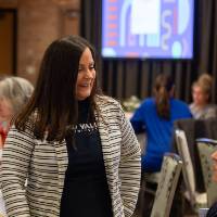 person standing and talking